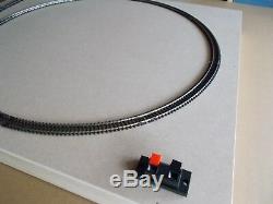 Small model railway baseboard with N gauge layout in new Peco Code 80 Setrack
