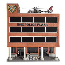 Menards O Gauge One Police Plaza can be translated to French as 'Menards O Jauge Un Poste de Police Plaza'.